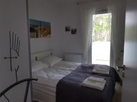 Kleines Schlafzimmer mit Meerblick